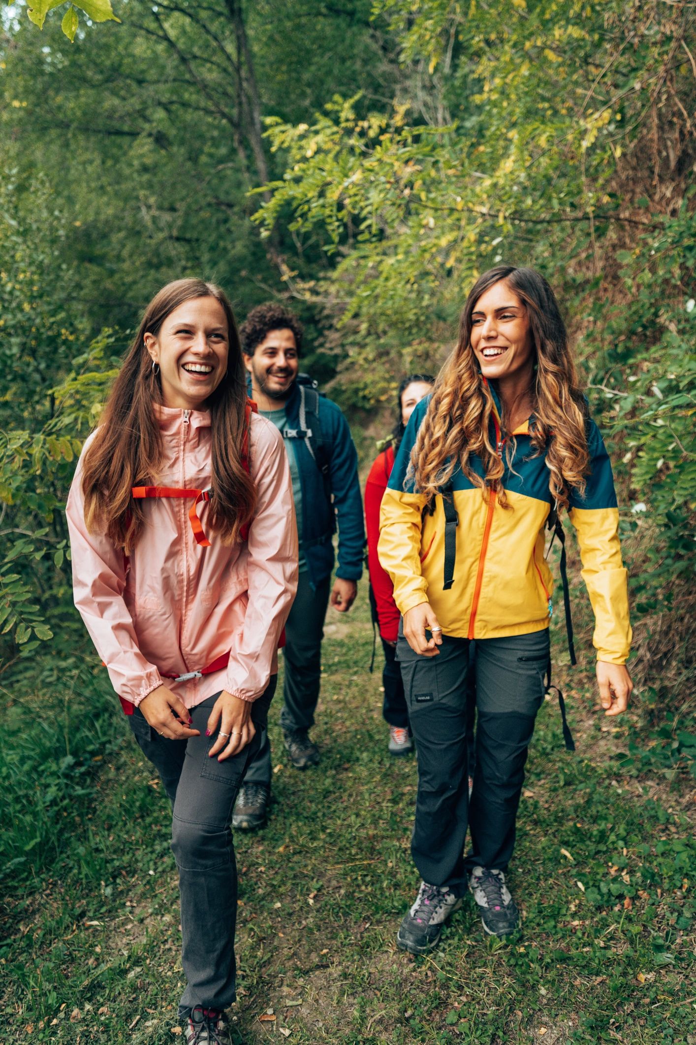 Friends hiking together on a trail